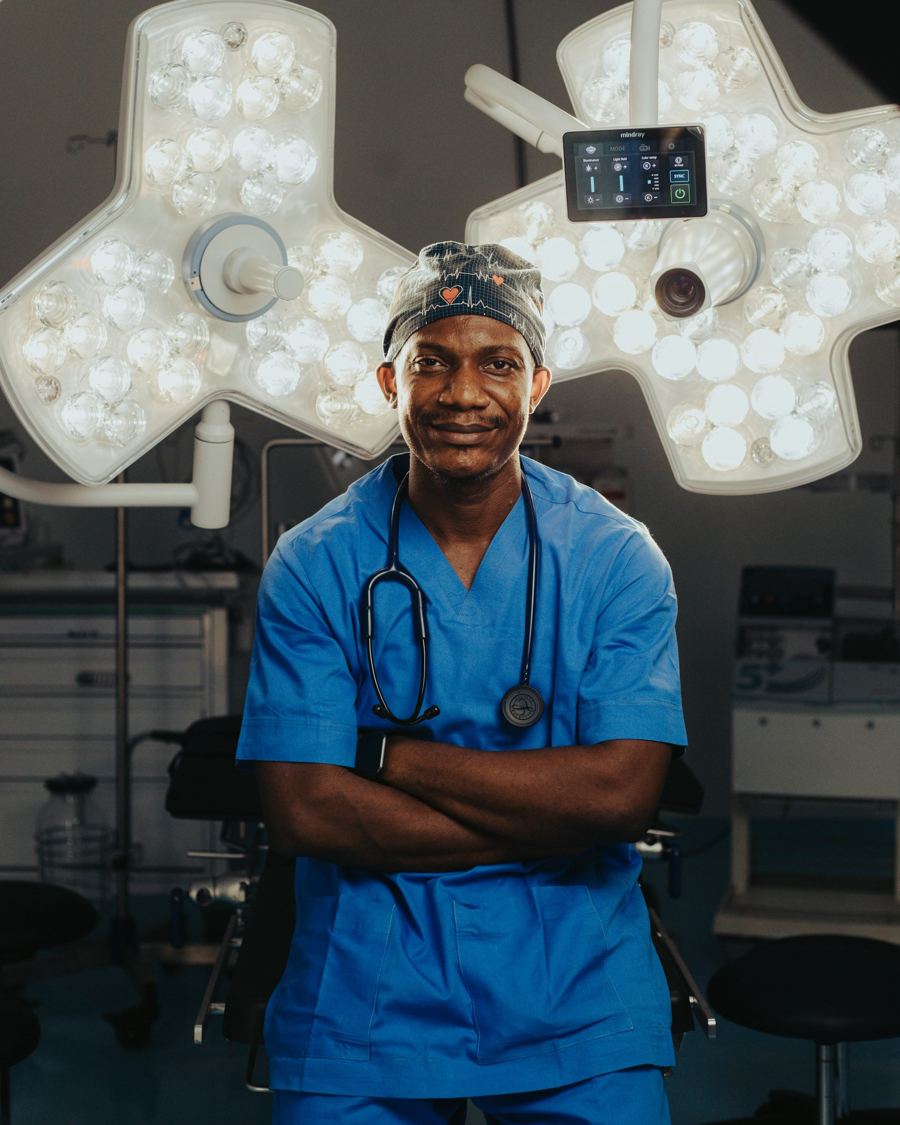 A surgeon stands in an operating theatre